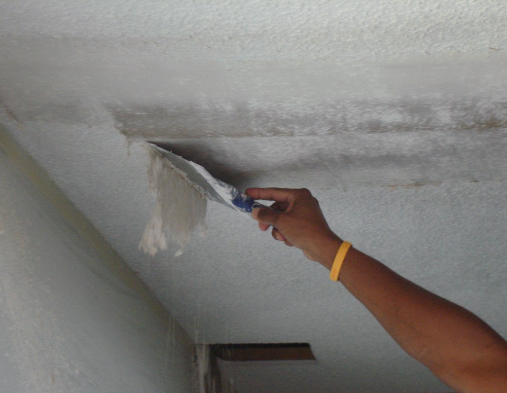 Learn how to remove popcorn ceiling texture and modernize your home.
